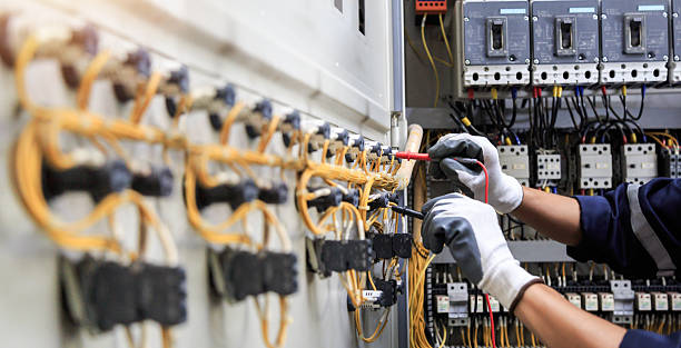 Professional Electrician technician working in Medford, MA